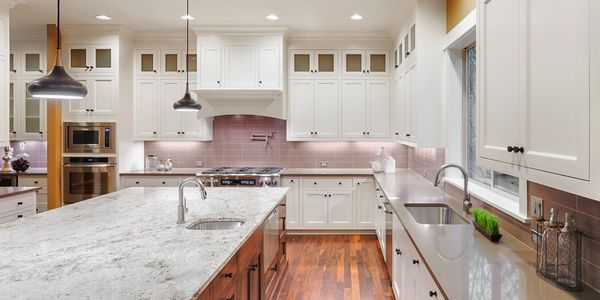 Luxury kitchen white cabinetry marble island